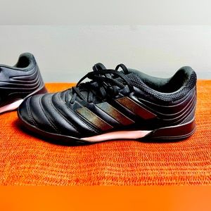 Adidas turf soccer cleats.